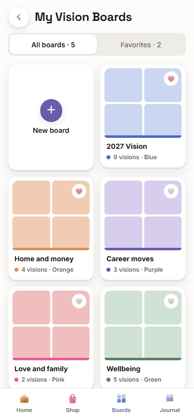 The Vision Boardly app on a phone showing five vision boards, each in its own colour